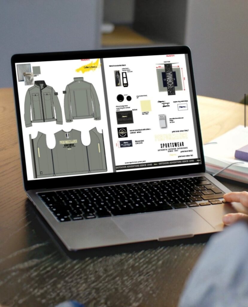Laptop mit technischen Zeichnungen und Materialdetails einer engbers Herrenjacke auf dem Bildschirm.